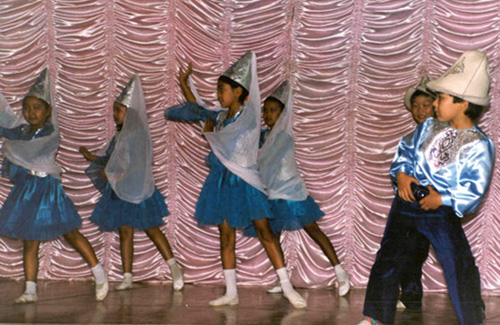 Traditional Kyrgrz Dance - the boys wear Krygrz hats