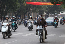 Motorbike Rider Wears Business Suit